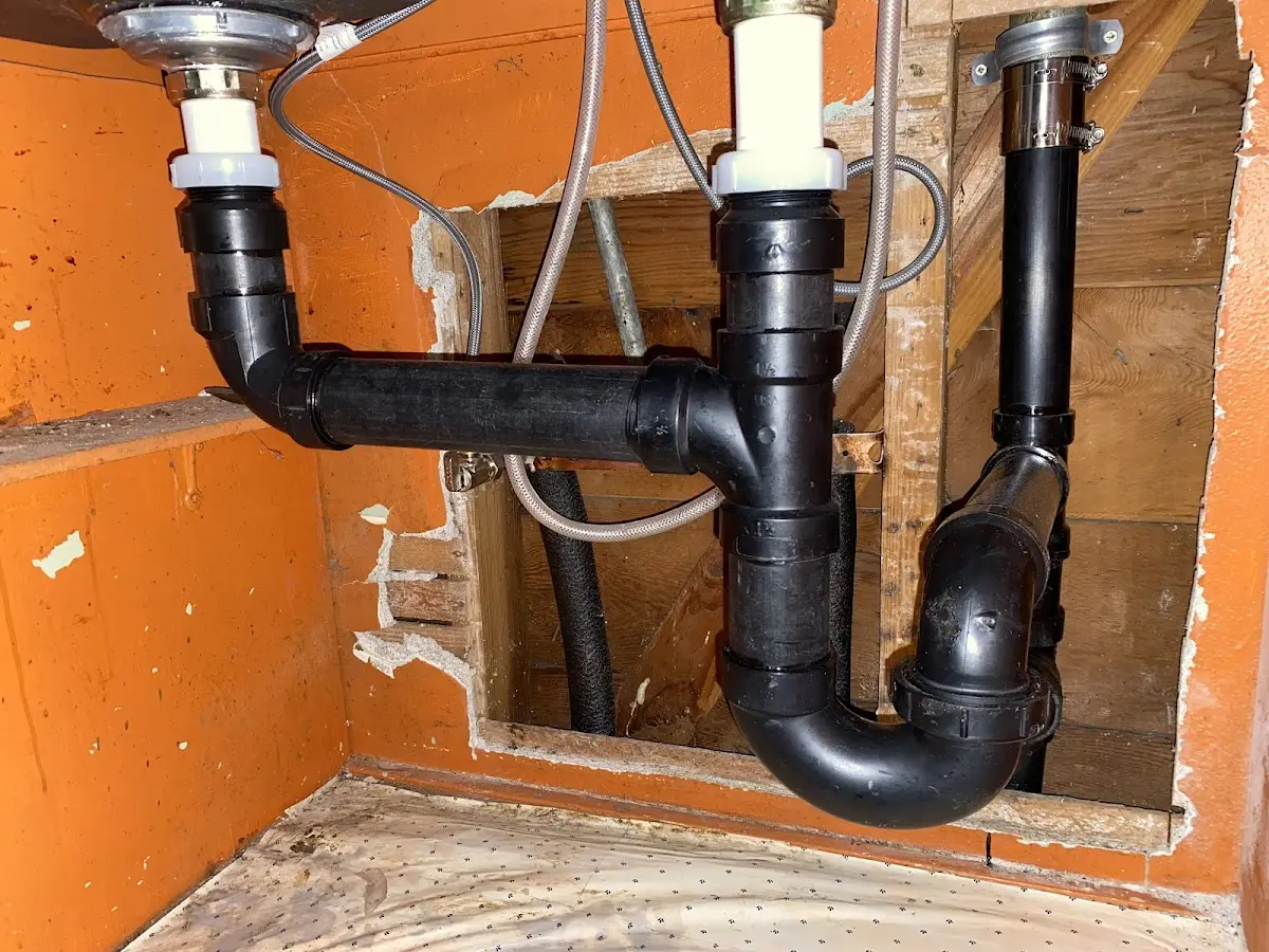 Professional Garbage Disposal Repair equipment and tools on the job in Sidney